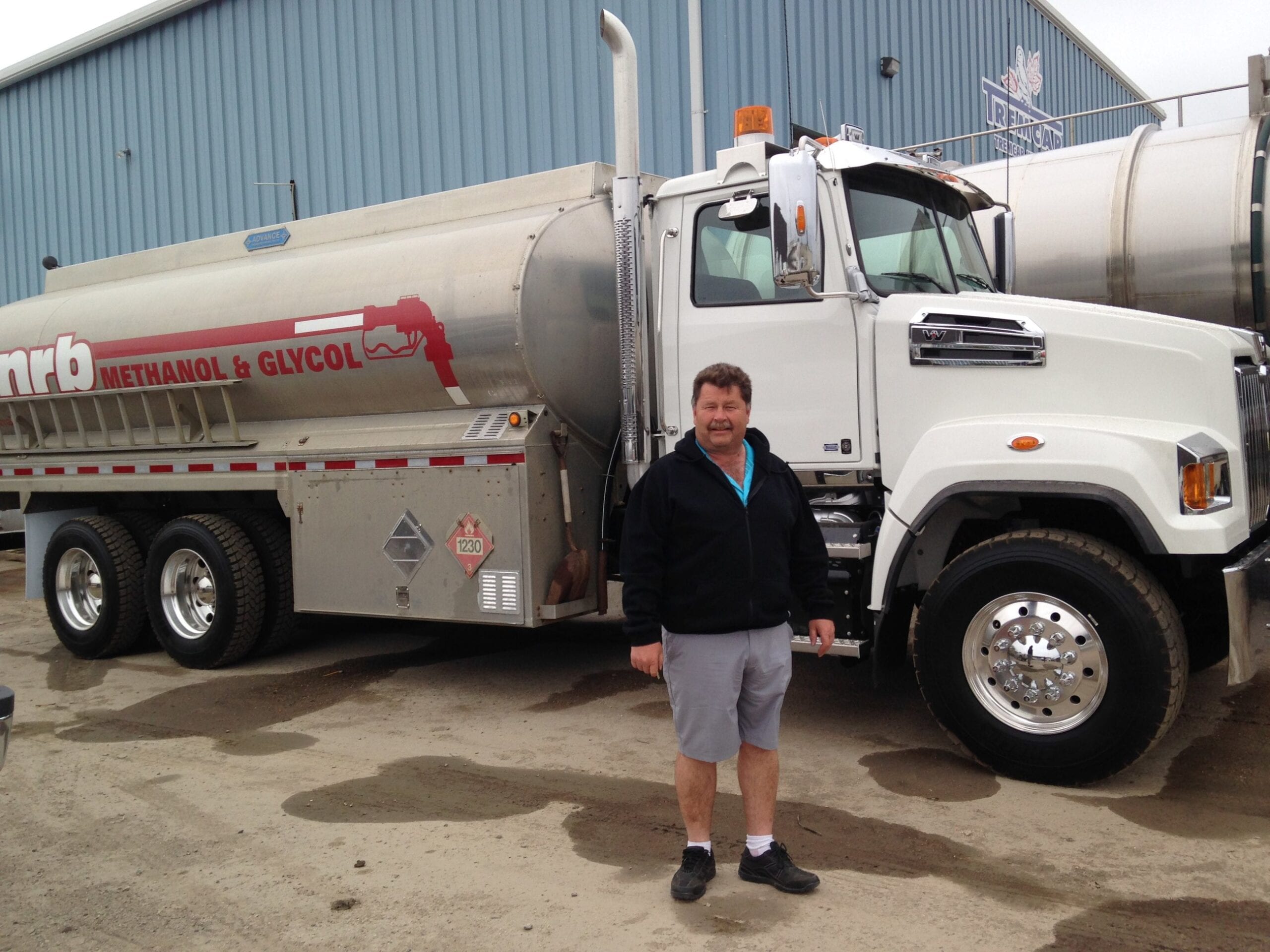 Person standing in front of the NRB truck